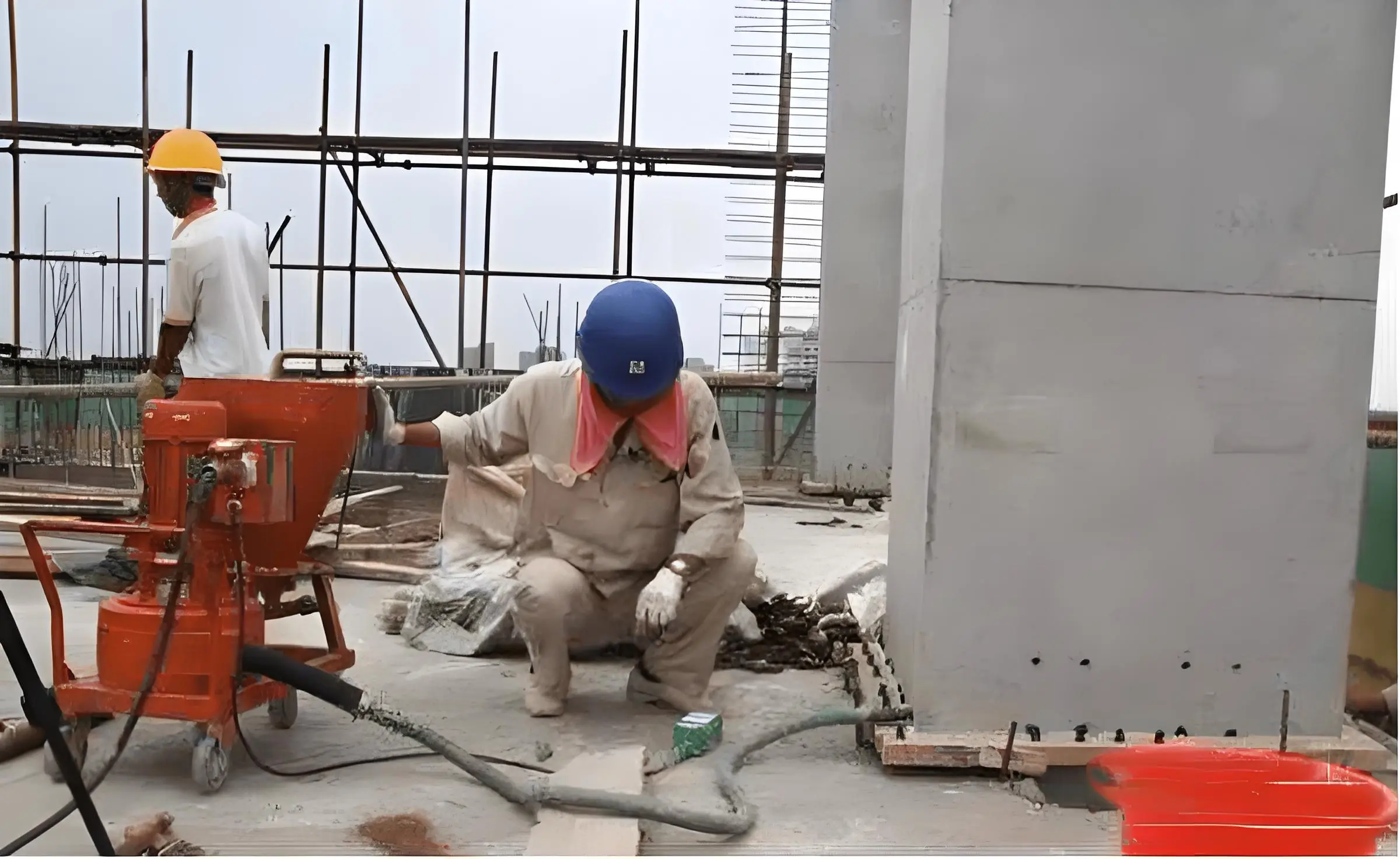 Workers are operating grouting