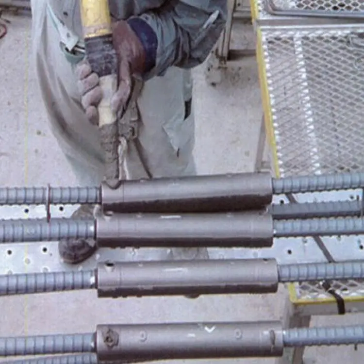 Injection of grouting material into the grouting sleeve